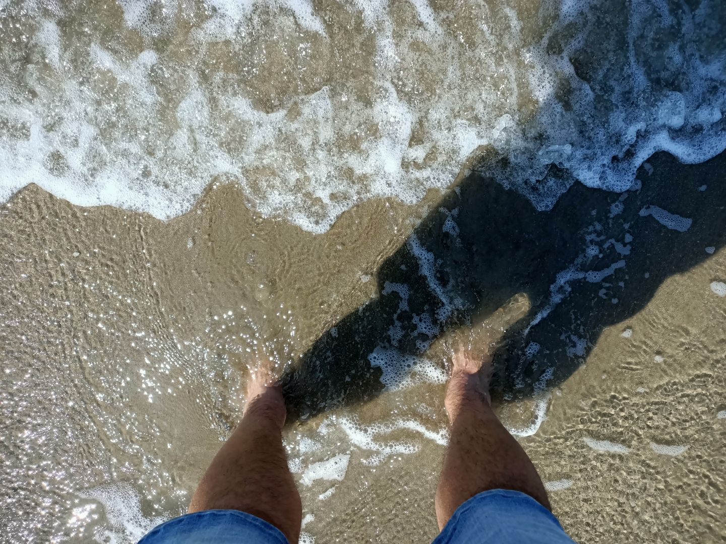 my feet in the sea