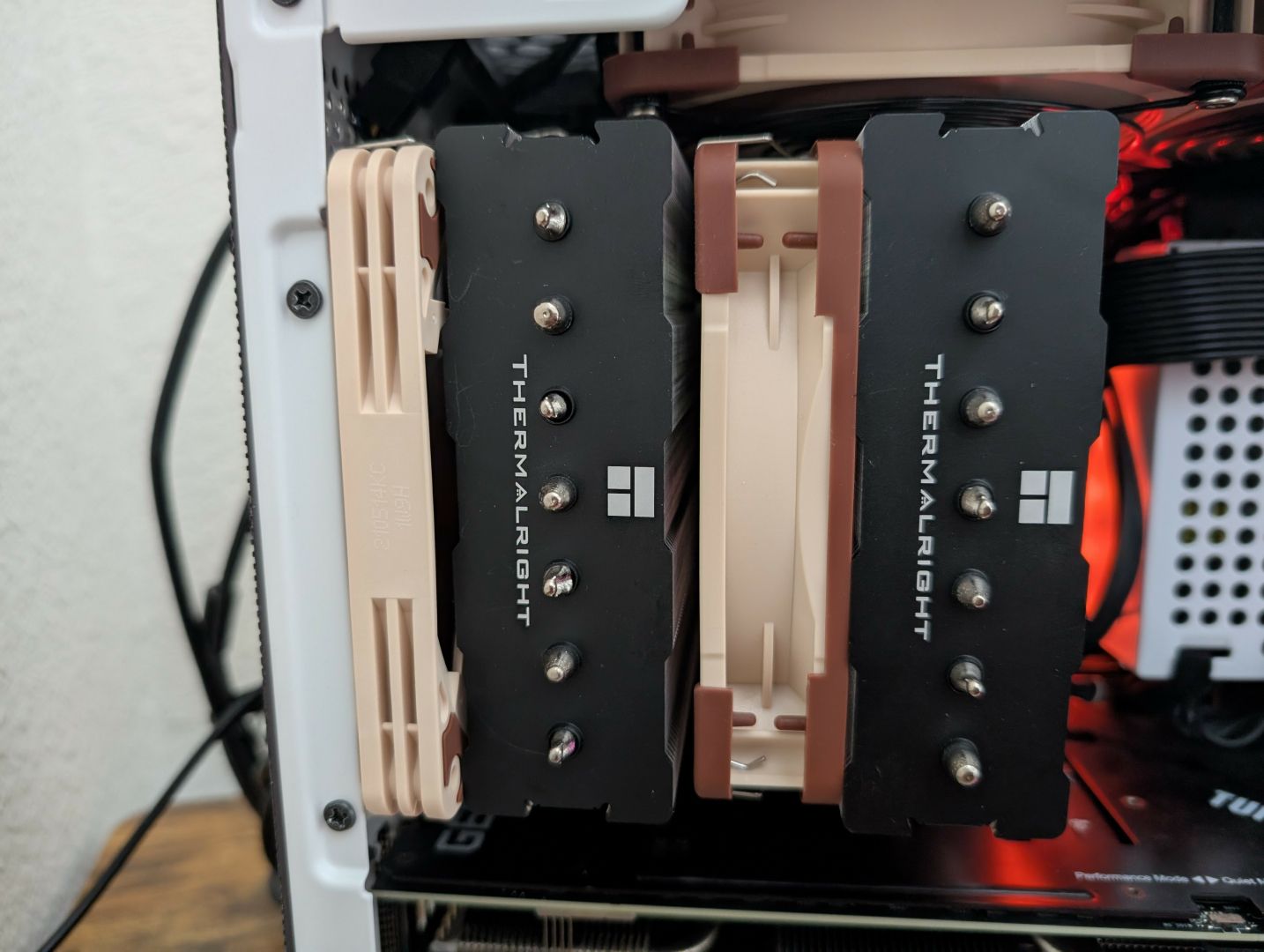 Picture of a Thermalright Phantom Spirit 120 inside an NR200 case, displaying fitment using a Noctua NF-A12x25 and NF-A12x15.