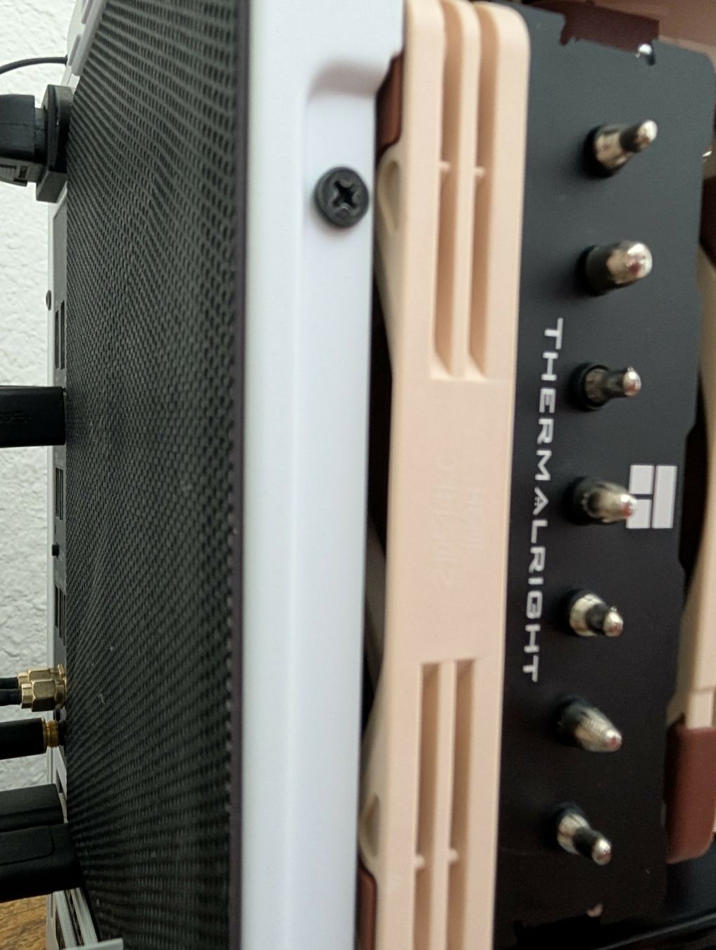 Picture of a Thermalright Phantom Spirit 120 inside an NR200 case, displaying fitment and clearance of the NF-A12x15.