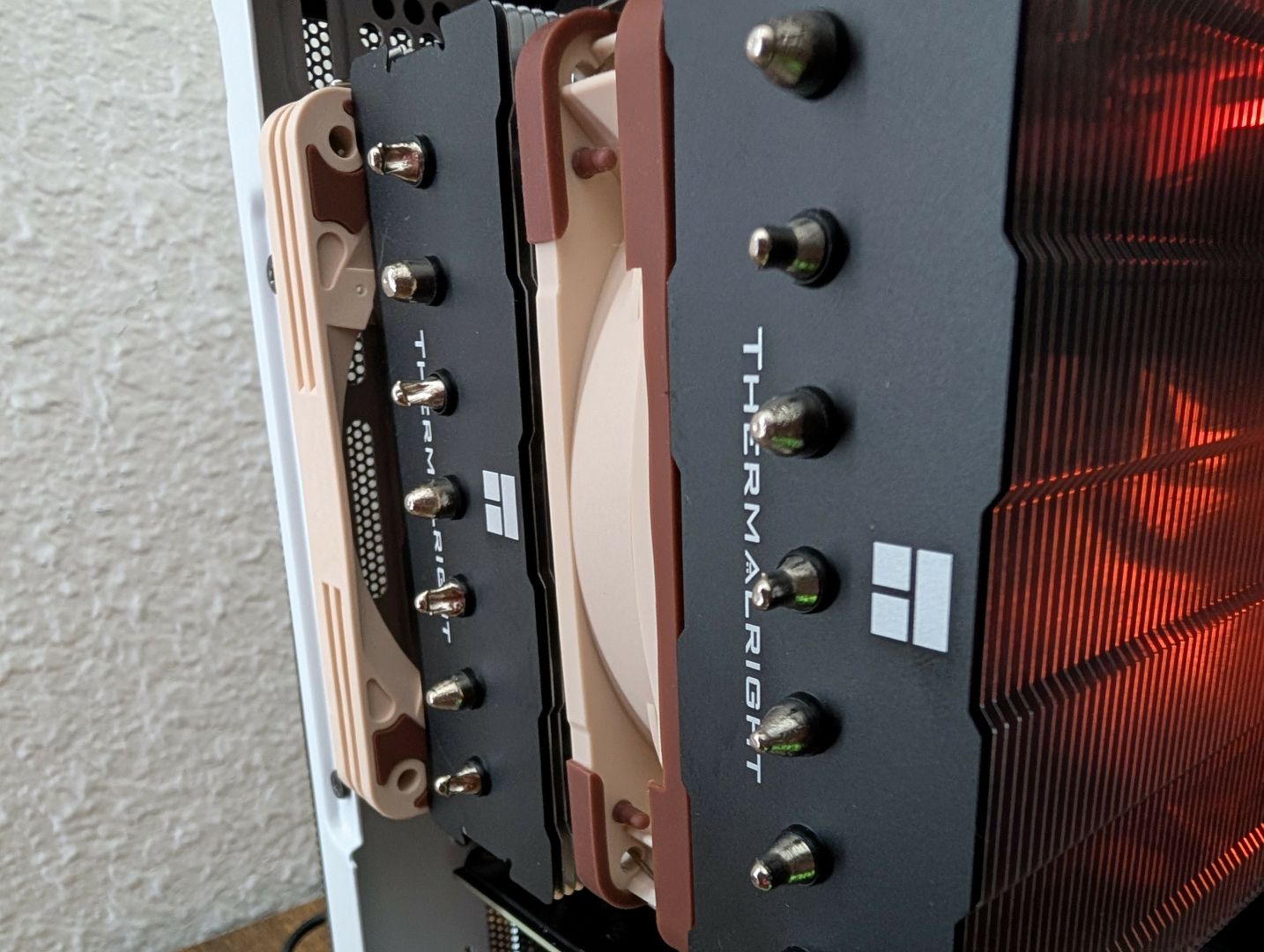 Picture of a Thermalright Phantom Spirit 120 inside an NR200 case, displaying fitment using a Noctua NF-A12x25 and NF-A12x15.