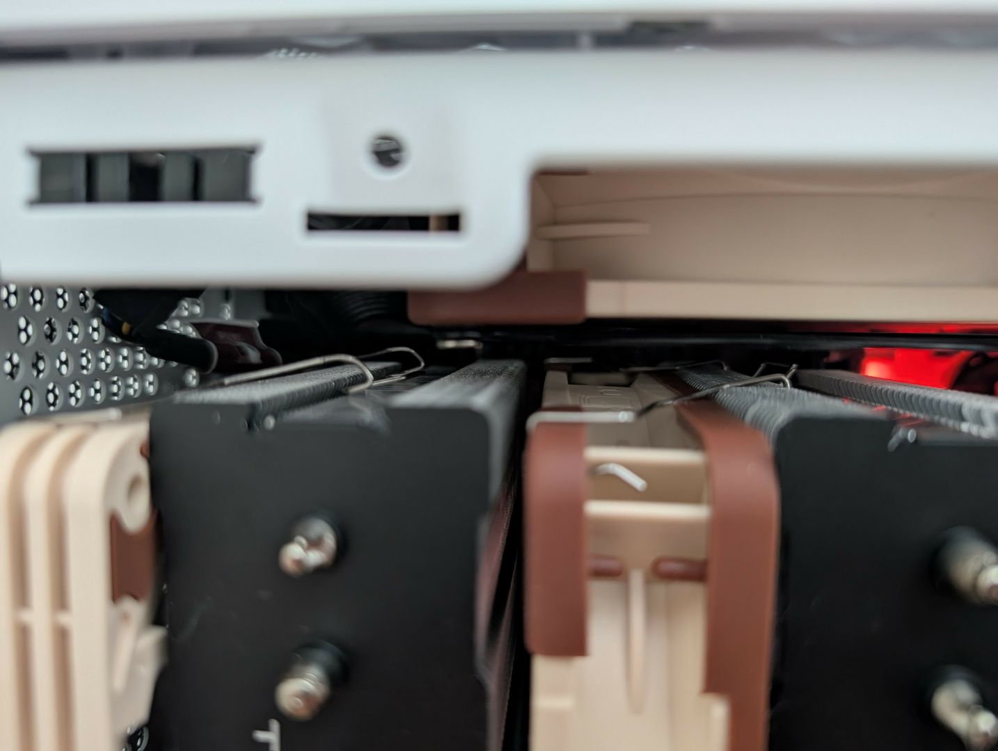 Picture of a Thermalright Phantom Spirit 120 inside an NR200 case, displaying clearance of the top case fans.