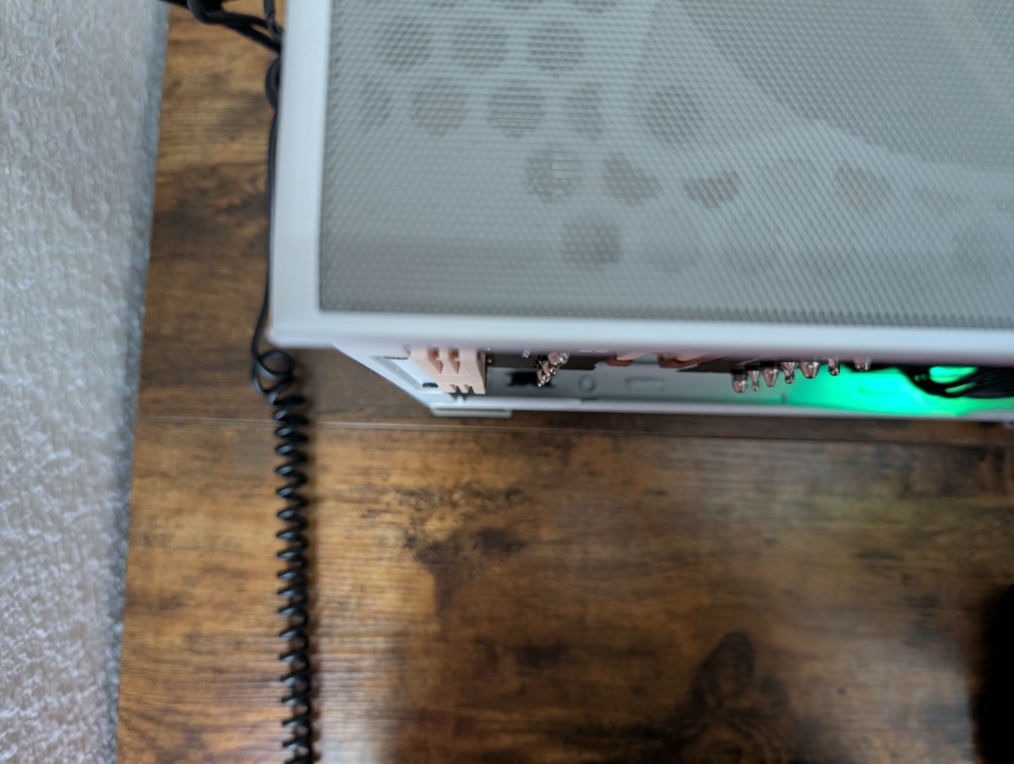 Top-down picture of a Thermalright Phantom Spirit 120 inside an NR200 case, displaying fitment of the NF-A12x15.