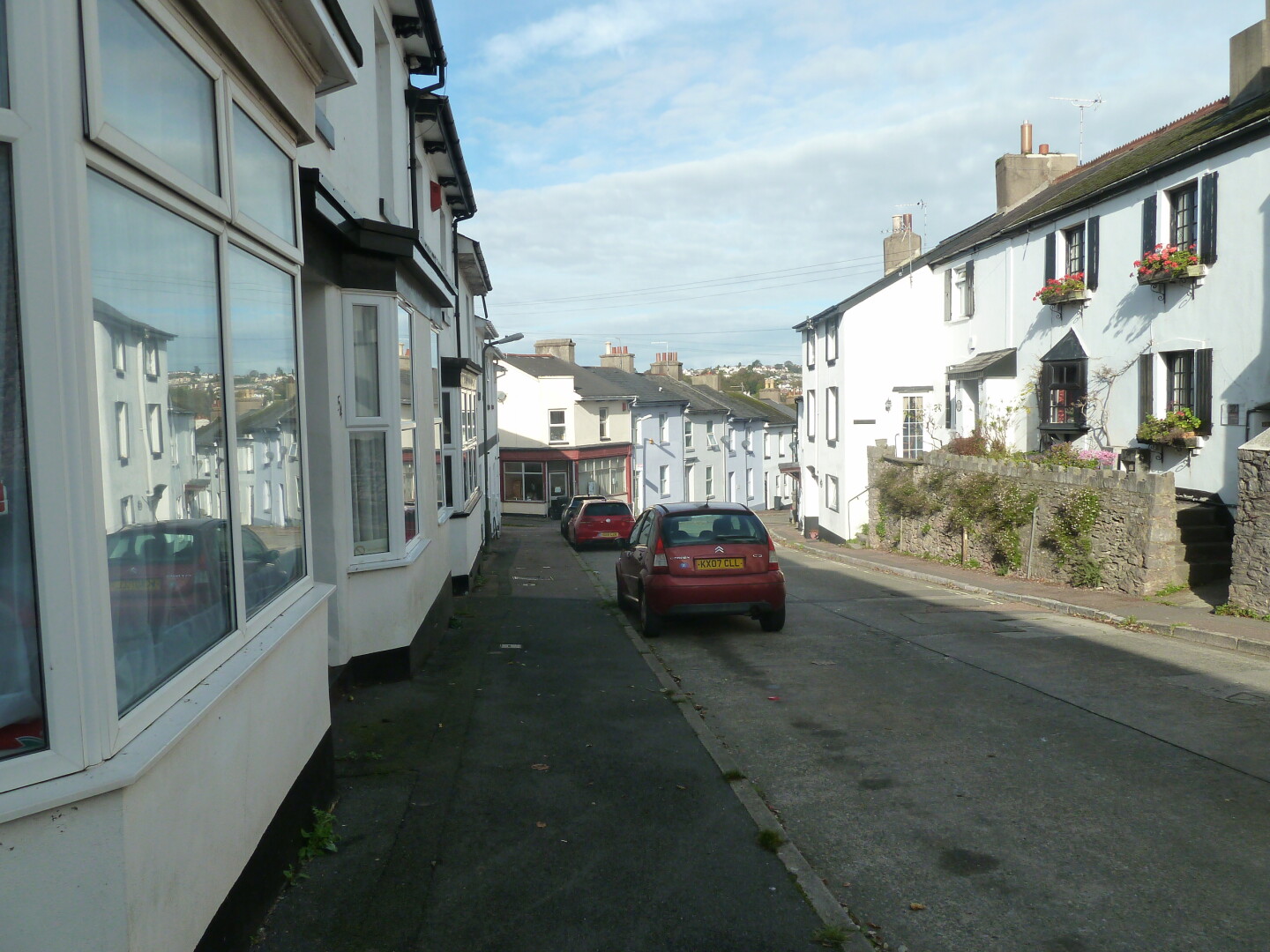 One of the roads in the area, with houses and other buildings.