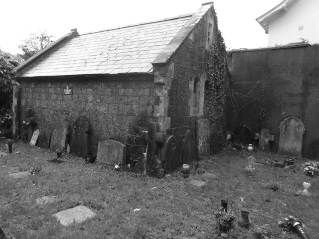 Photo of the C of E Churchyard in St. Marychurch, Torquay  One of the small out-buildings on site