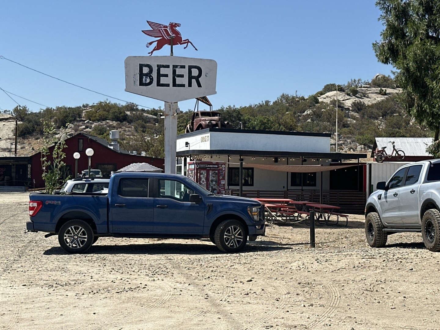 Garage 79 wide shot. It’s a gas station converted to a boutique beer bar in the Southern California hills